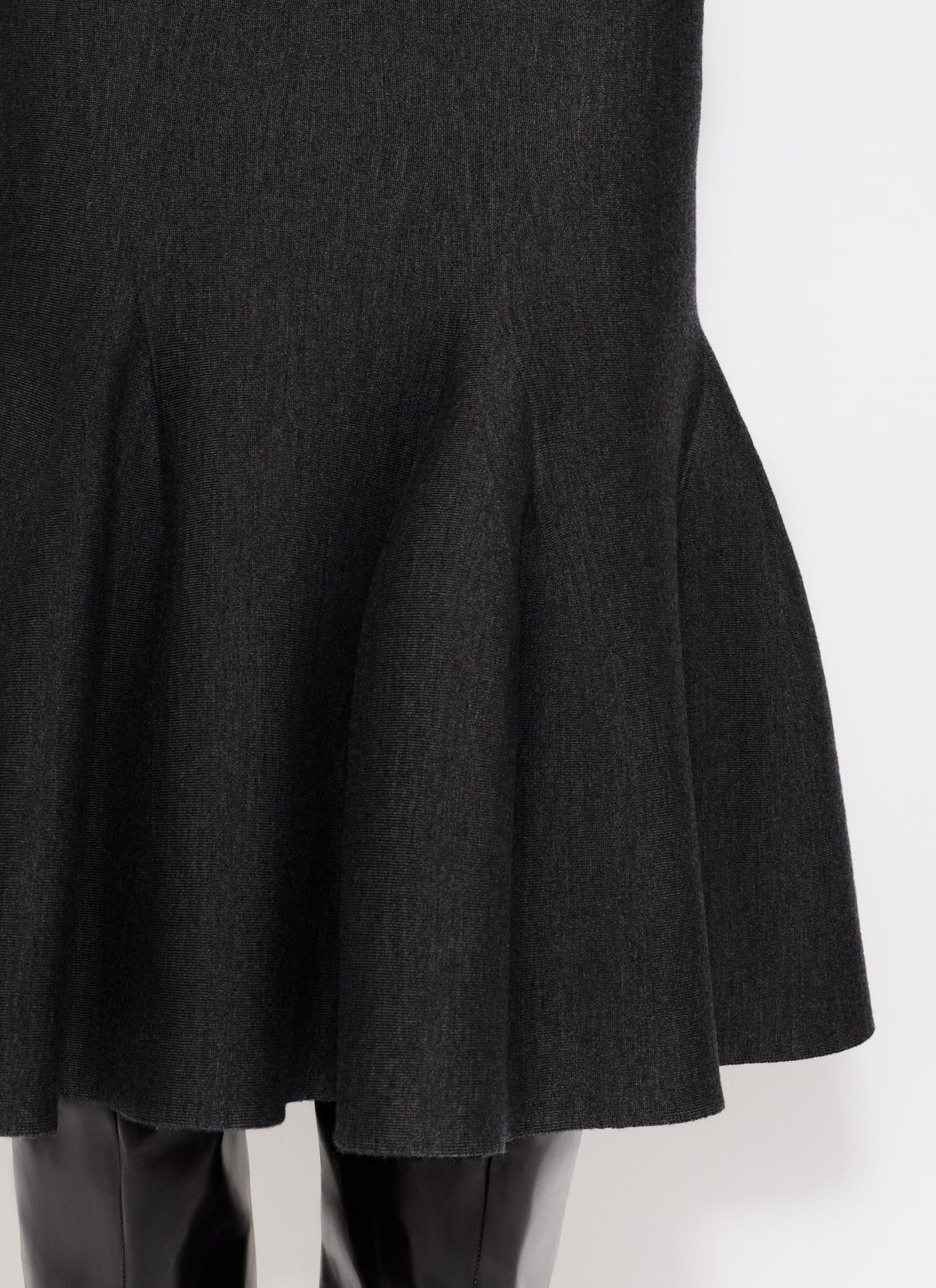 MIDI SKIRT IN SCULPTURAL GODET KNIT ALAÏA BLACK MIDI SKIRT IN SCULPTURAL GODET KNIT